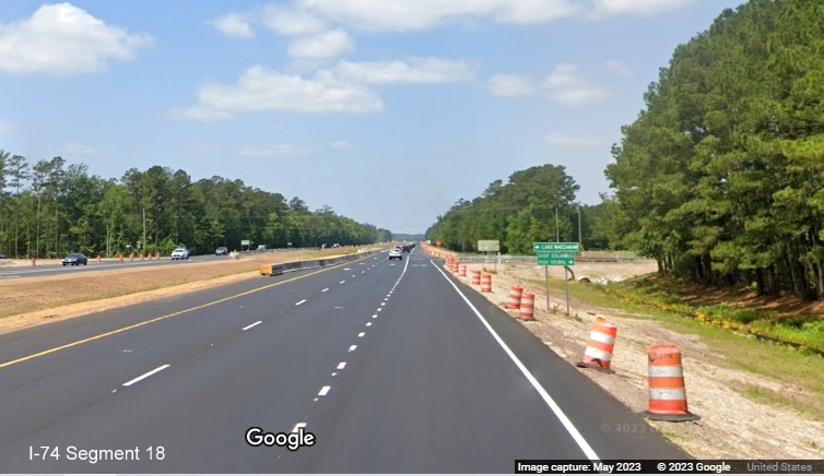 Image approaching the current Old Lake Road intersection on US 74/76 West, Google Maps Street View, 
        May 2023