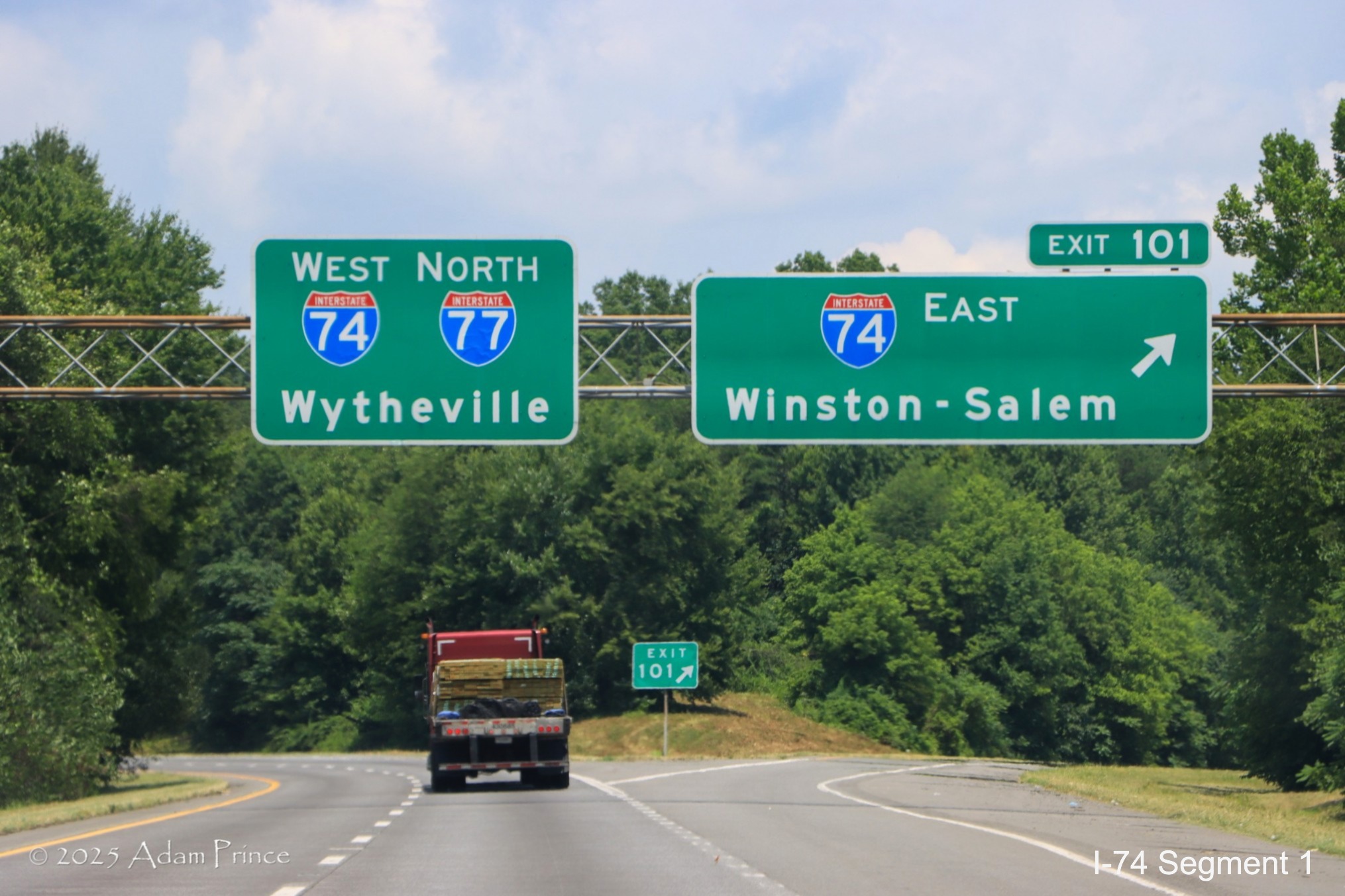 Image of I-74 West/I-77 North pull through sign at ramp sign for I-74 East
	  exit in Surry County, Adam Prince, June 2025