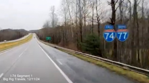 Image of East I-74/South I-77 reassurance markers still in place 
	  after the Rest Area on-ramp in Surry County, Google Maps Street View image, December 2024