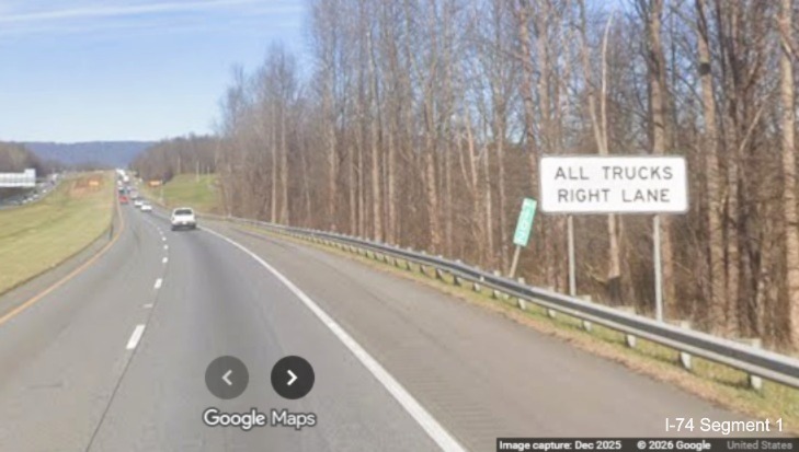 Image of unchanged Mile 102 marker on I-74 West/I-77 North in Surry County, 
	  Google Maps Street View, December 2025