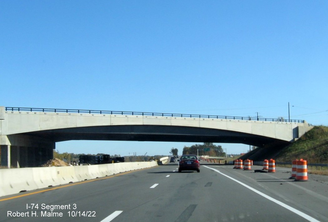 Image of NC 65 bridge with new US 52 North lanes under construction approaching the future 
       I-74/Winston-Salem Northern Beltway interchange in Rural Hall, October 2022