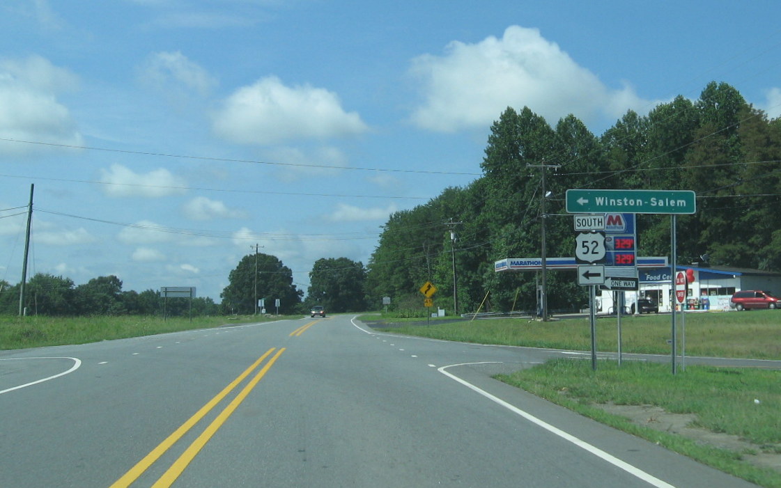 Photo of typical US 52 exit signage, for US 52 South in Pinnacle in July 2012