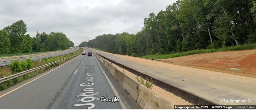 Image of paved US 52 North lanes approaching Westinghouse Road as part of 
       Winston-Salem Northern Beltway interchange project, Google Maps Street View, June 2023