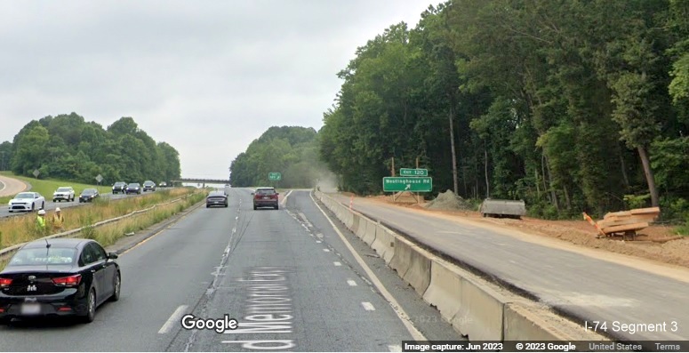 Image of US 52 North lanes under construction at Westinghouse Road exit as part of 
       Winston-Salem Northern Beltway interchange project, Google Maps Street View, June 2023
