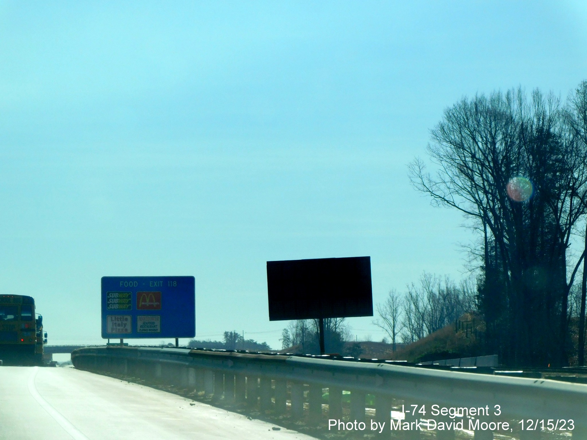 Image of temporary 1 mile VMS advance sign for completed Winston-Salem Northern Beltway interchange
        after the NC 65 exit, by Mark David Moore, December 2023