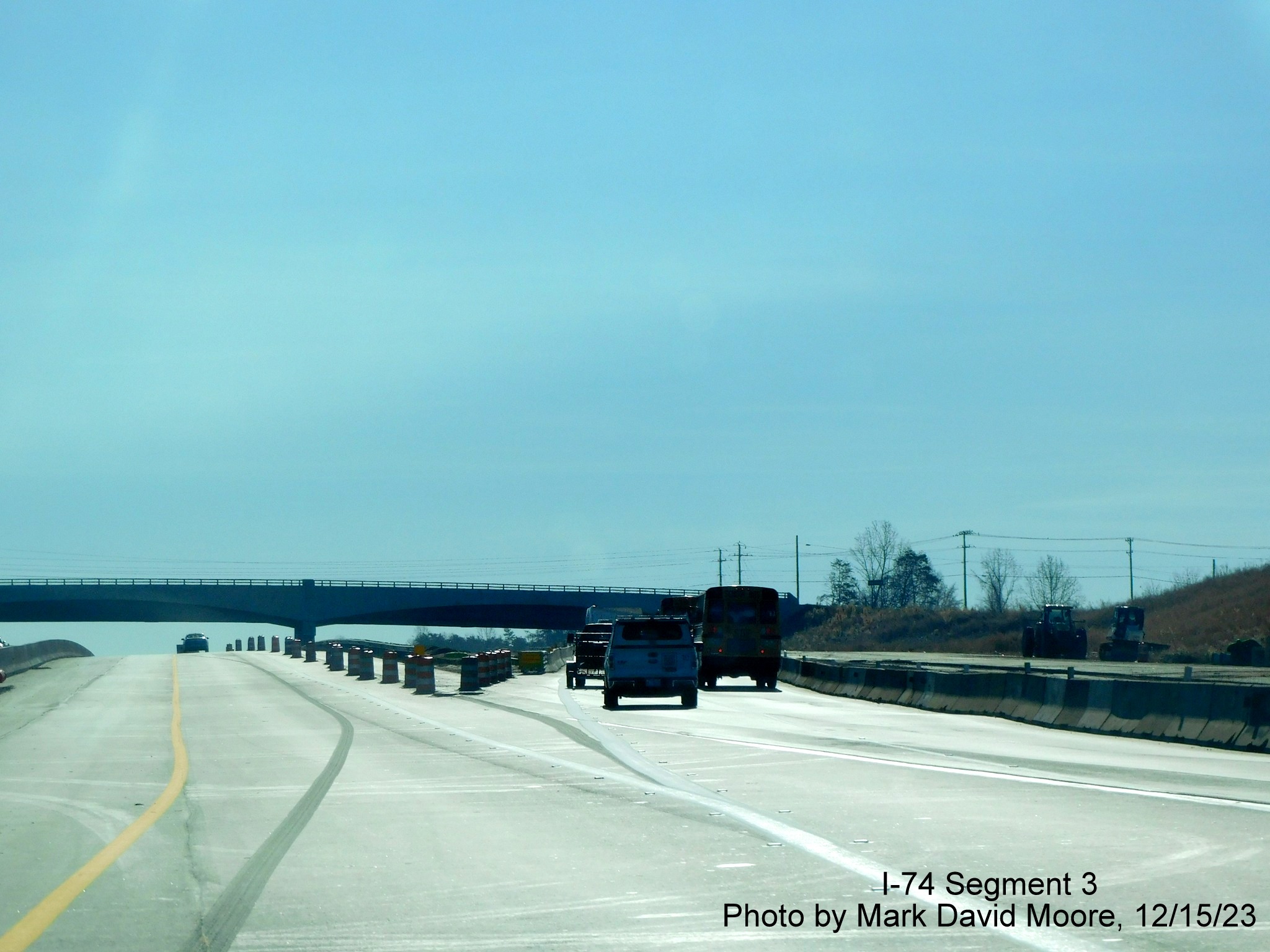 Image of temporary split between US 52 South lanes and NC 74 East Winston-Salem 
	  Northern Beltway lanes prior to the NC 65 exit, by Mark David Moore, December 2023