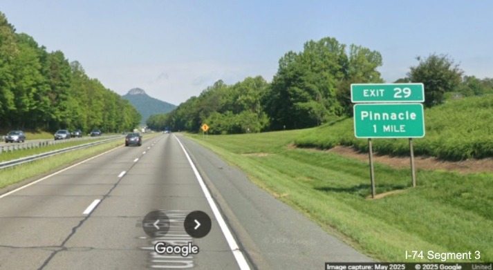 Image of ground mounted 1 mile advance sign for the Pinnacle
exit on US 52 North (Future I-74 West) with new I-74 milepost exit number, Google Maps Street View, May 2025
