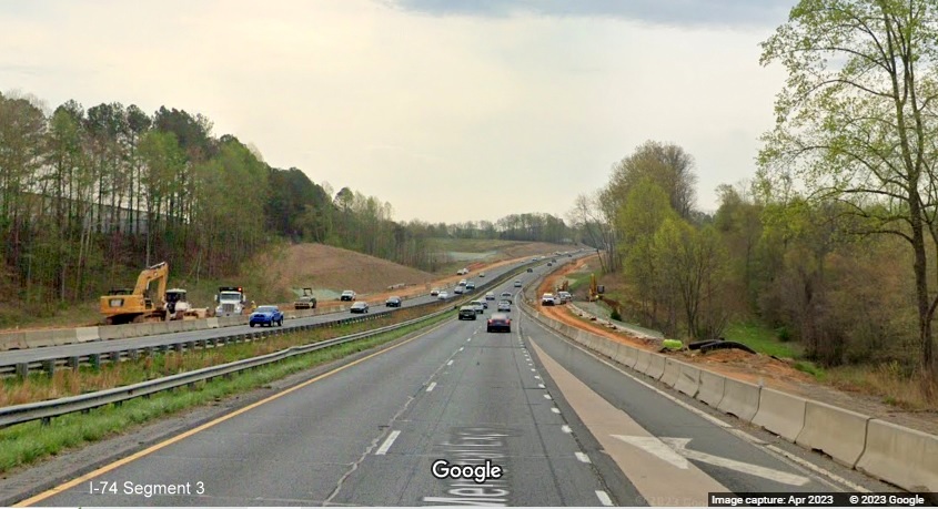 Image of start of construction zone for future I-74/Winston-Salem Beltway just beyond 
	  Westinghouse Road on US 52 South (Future I-74 East), Google Maps Street View, April 2023