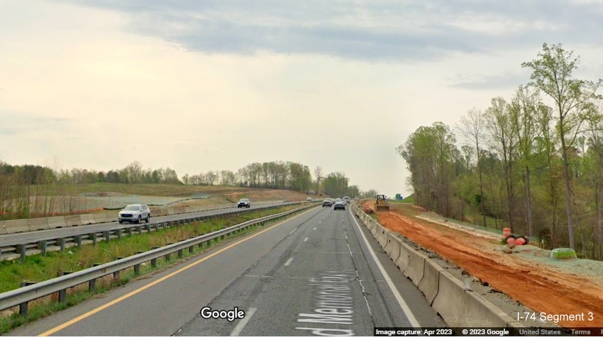 Image of construction zone for future I-74/Winston-Salem Beltway beyond Westinghouse 
        Road on US 52 South (Future I-74 East), Google Maps Street View, April 2023