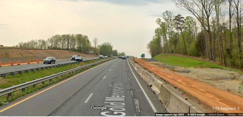 Image of construction zone for future I-74/Winston-Salem Beltway beyond Westinghouse 
        Road on US 52 South (Future I-74 East), Google Maps Street View, April 2023