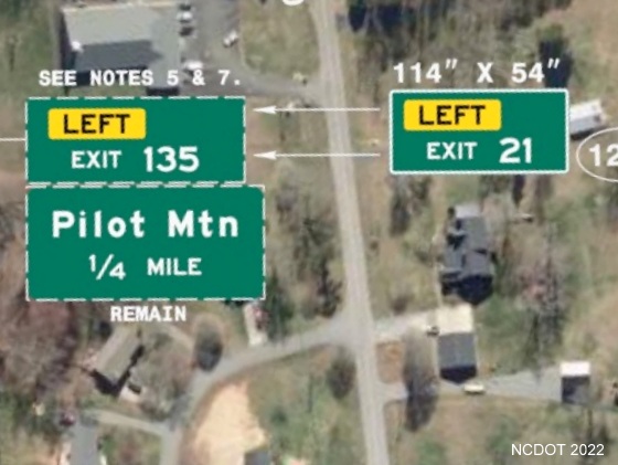 Image of plan for new Left exit number tab with I-74 milepost number to 
	  be placed on sign for Pilot Mountain on US 52 South in Surry County, NCDOT August 2022