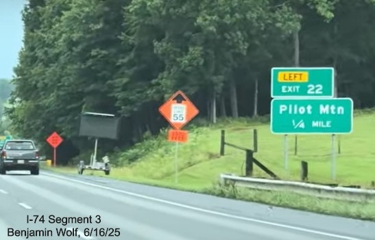 Image of renumbered 1/4 Mile advance sign for the Pilot Mountain exit on 
	  US 52 South (Future I-74 East), screen grab from Benjamin Wolf video, June 2025