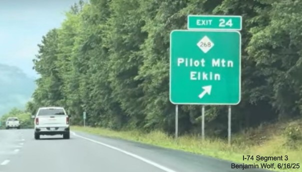 Image of renumbered ground mounted ramp sign for the NC 268 exit on 
	  US 52 South (Future I-74 East), screen grab from Benjamin Wolf video, June 2025