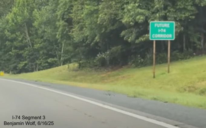 Image of new text Future I-74 Corridor sign after the Stokes County line on 
	  US 52 South (Future I-74 East), screen grab from Benjamin Wolf video, June 2025