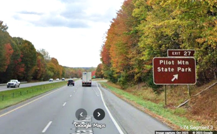 Image of renumbered brown ground mounted ramp sign for the Pilot Mountain State 
	  Park exit on US 52 South (Future I-74 East), Google Maps Street View, October 2025