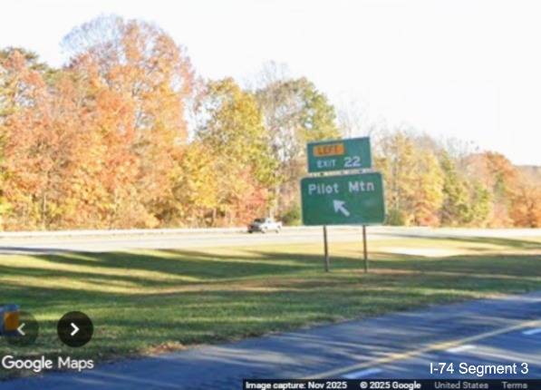 Image of renumbered left side ramp sign for the Pilot Mountain exit on 
	  US 52 South (Future I-74 East), Google Maps Street View, November 2025