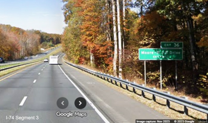 Image of renumbered 1 mile advance sign for the Moore-RJR Drive
	  exit on US 52 North (Future I-74 West), Google Maps Street View, November 2025