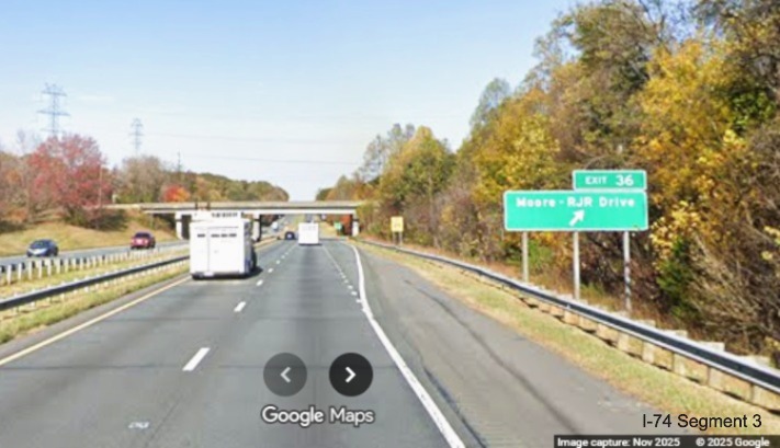 Image of renumbered blue services sign for the King/Tobaccoville exit
	  on US 52 North (Future I-74 West), Google Maps Street View, November 2025