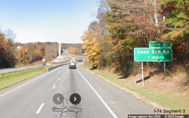 Image of renumbered ground mounted 1 mile advance sign for Cook School Road 
	  exit on US 52 North (Future I-74 West), Google Maps Street View, November 2025