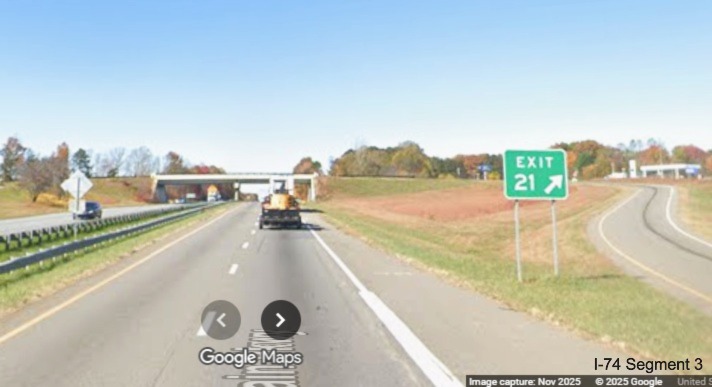 Image of renumbered gore sign for the Cook School Road exit on
	  US 52 North (Future I-74 West), Google Maps Street View, November 2025