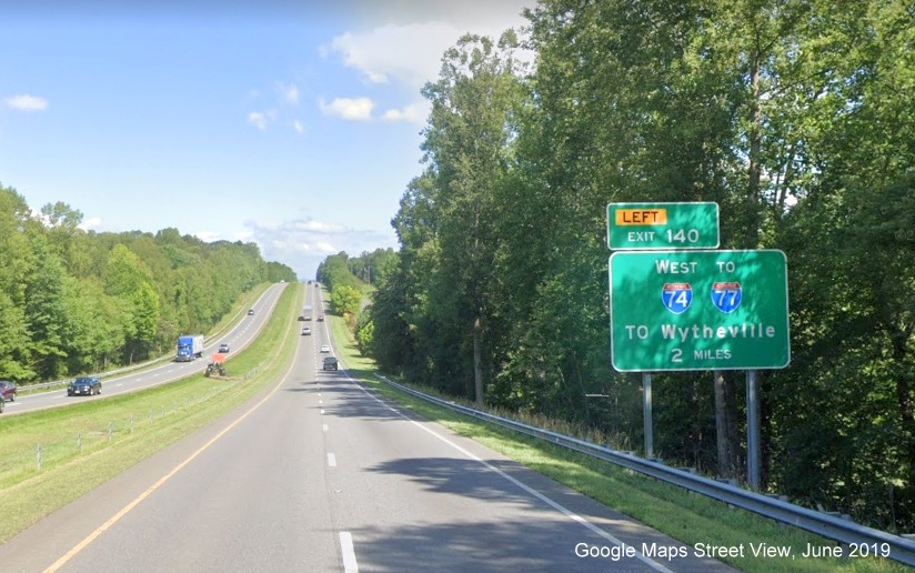 Google Maps Street View image of 2-miles advance sign for I-74 West 
	  exit on US 52 North/Future I-74 West in Mount Airy, taken in June 2019