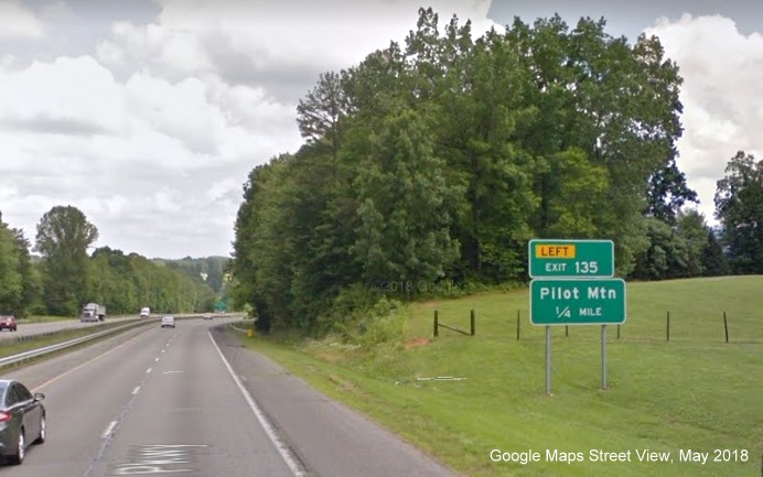 Google Maps Street View image of 1/4 mile advance sign for left side 
	  Pilot Mountain exit on US 52 South/Future I-74 East, taken in May 2018