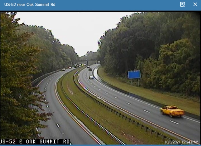 Google Maps Street View image showing completion of shoulder widening north 
	  of the future I-74/Winston Salem Northern Beltway interchange, October 2021