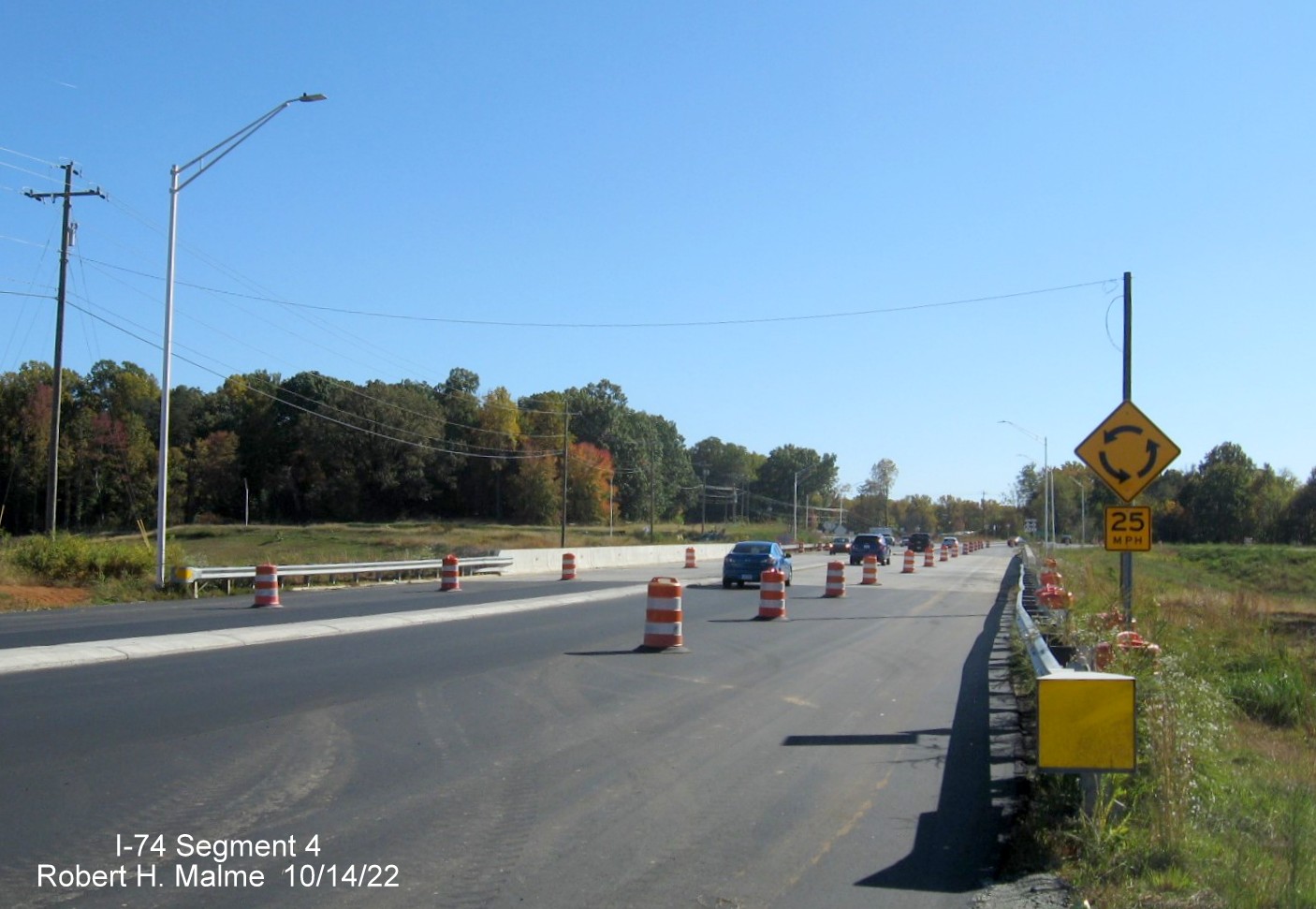 Image of heading south on NC 8/Germanton Road over of the bridge across the Winston-Salem Northern
        Beltway between the future ramps to NC 74, October 2022