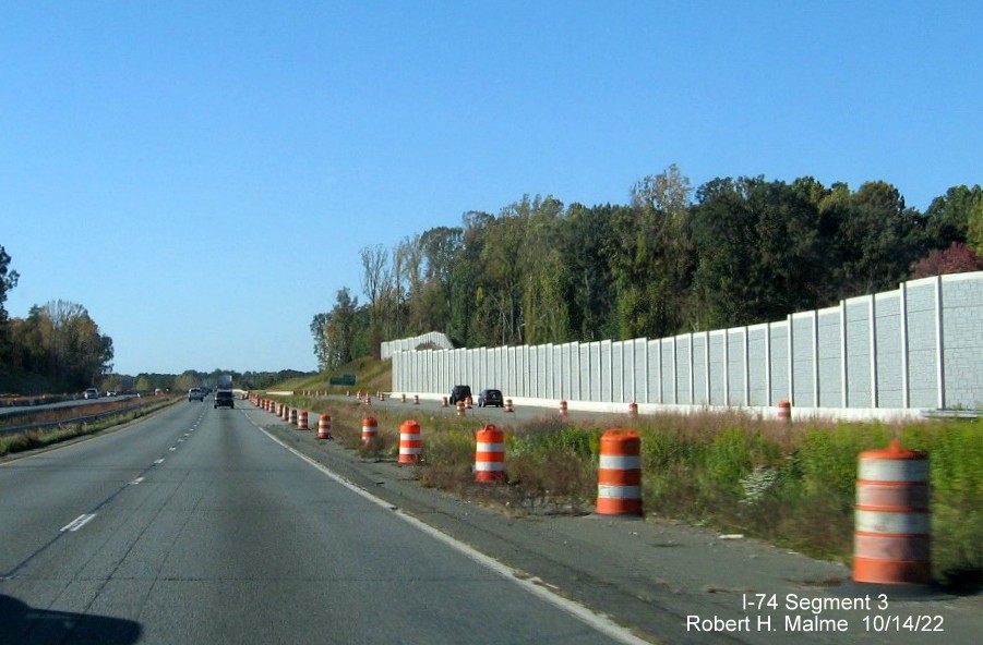 Image of signage on US 52 South for the NC 65 exit approaching the future 
       I-74/Winston-Salem Northern Beltway interchange in Rural Hall, October 2022