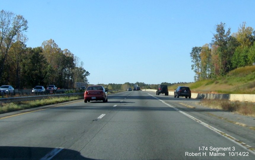 Image of US 52 North lanes being widened at merge with the NC 65 exit aa part of the 
	  project building the future I-74/Winston-Salem Northern Beltway interchange in Rural Hall, October 2022