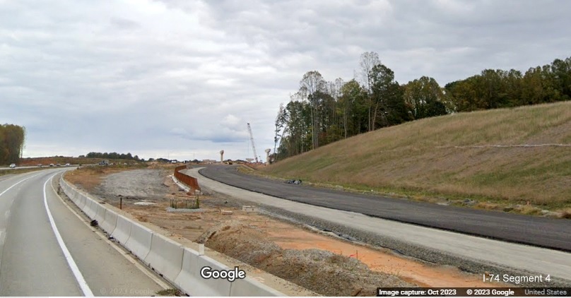 Image of paved future ramp to I-74 West/Winston-Salem Northern Beltway from I-40 East 
        in Forsyth County, Google Maps Street View, October 2023