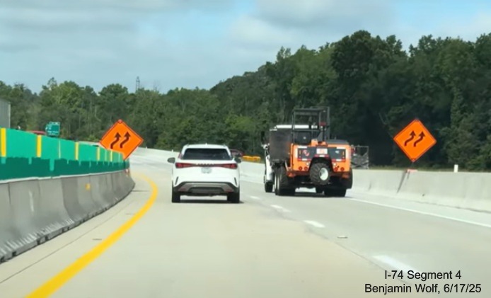 Image of traffic on I-40 West returning to original alignment after future 
	  flyover ramps for the I-74 / Winston-Salem Northern Beltway, screen grab from Benjamin Wolf video, June 2025