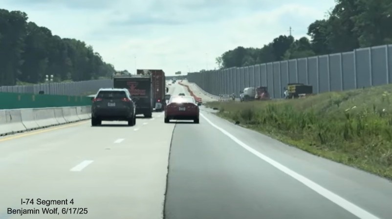 Image of traffic on I-40 East approaching the future on-ramp from
	  the I-74 West / Winston-Salem Northern Beltway, screen grab from Benjamin Wolf video, June 2025