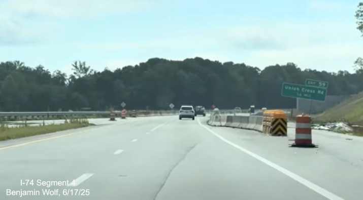 Image of traffic on I-74 East passing through the future I-74 /
	  Winston-Salem Northern Beltway interchange, screen grab from Benjamin Wolf video, June 2025