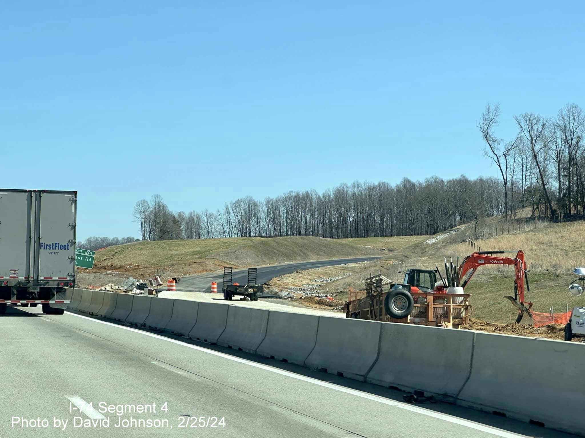 Image of work proceeding on future exit ramp to I-74/Winston-Salem Northern Beltway East from 
        I-40 East in Forsyth County, by David Johnson, February 2024