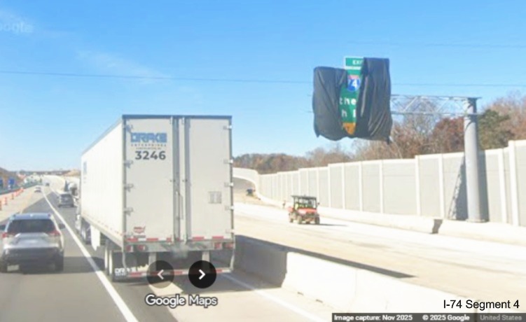 Image of Future I-74 exit sign only partly covered up along I-40 West after
the Union Cross Road exit ramp, Google Maps Street View, November 2025