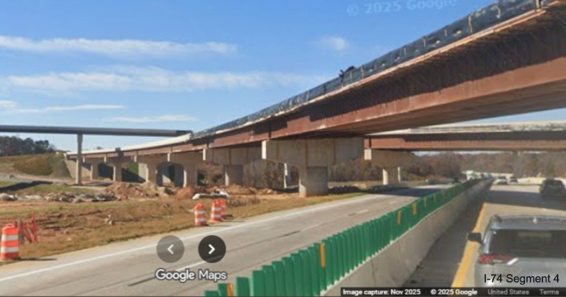 Image of Future I-40 West to I-74 East flyover ramp under construction from
current I-40 West lanes, Google Maps Street View, November 2025