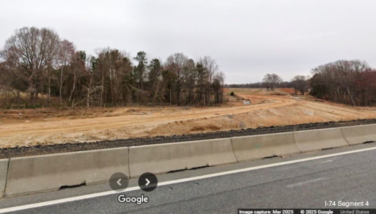 Image of looking back at the future on-ramp from I-74 East to NC 192 West 
	  being constructed for the Winston-Salem Northern Beltway interchange project, Google Maps Street View, March 2025