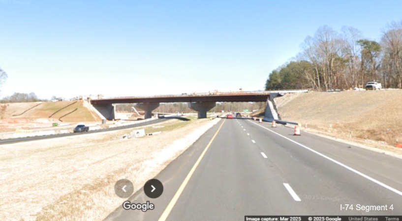 Image of bridge of future on-ramp to the westbound
	  Winston-Salem Northern Beltway interchange from I-74 East, Google Maps Street View, March 2025