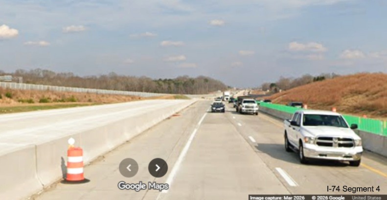 Image of I-40 West traffic still using I-40 East lanes approaching the I-74 Beltway
flyover ramps in the Winston-Salem Northern Beltway interchange work zone, screen grab from Google Maps Street View, March
2026
