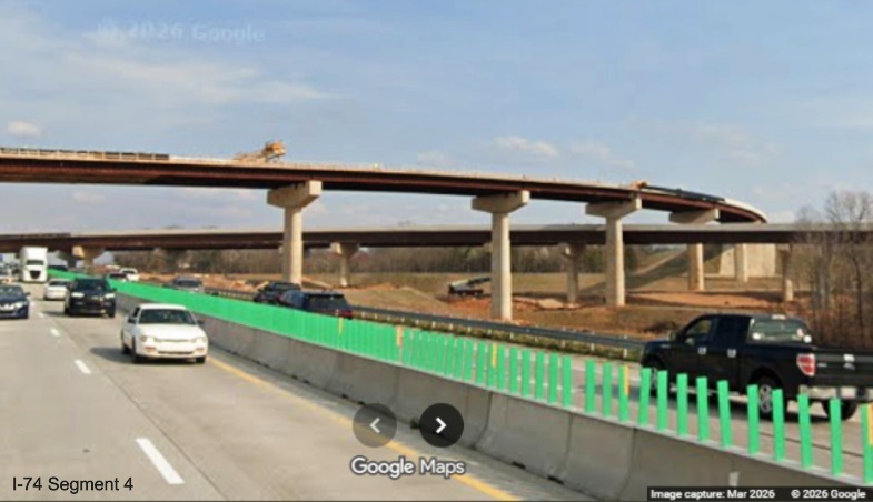 Image of I-40 West traffic still using I-40 East lanes going under the I-74 Beltway
flyover ramps in the Winston-Salem Northern Beltway interchange work zone, screen grab from Google Maps Street View, March
2026