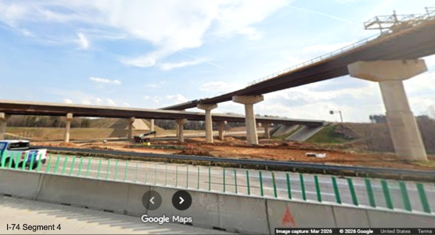 Image looking I-40 East lanes at two sets of flyover ramps for the I-74 Beltway
in the Winston-Salem Northern Beltway interchange work zone, screen grab from Google Maps Street View, March 2026