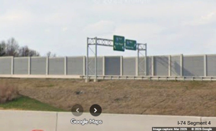 Image zoomed in looking across future I-40 West lanes at overhead signage on the
future flyover ramp from I-40 West to the I-74 West Beltway in the Winston-Salem Northern Beltway interchange work zone,
screen grab from Google Maps Street View, March 2026