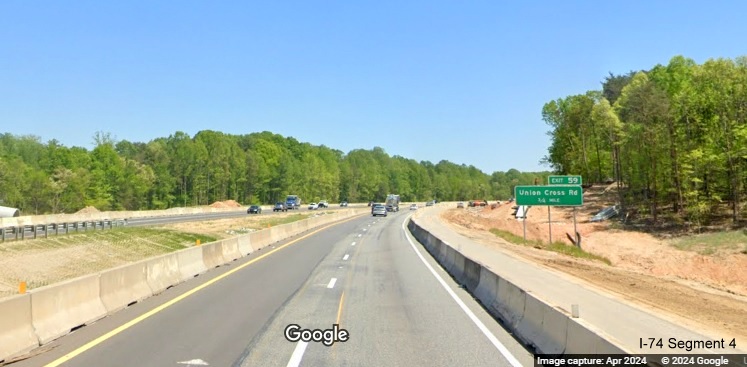 Image of construction on I-74 East at the 3/4 Mile advance sign for Union Cross Road in the 
        Winston-Salem Northern Beltway interchange work zone, Google Maps Street View, April 2024