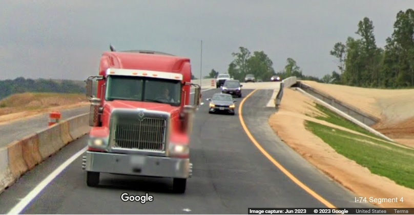 Image of new US 52 North roadway crossing bridge over future I-74 East lanes as part of the 
        future Winston-Salem Northern Beltway interchange construction project, Google Maps Street View, June 2023