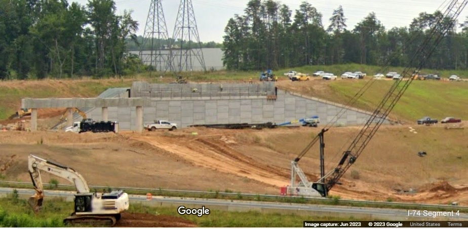 Image looking east at future I-74 lanes beign constructed as part of the 
        future Winston-Salem Northern Beltway interchange project, Google Maps Street View, June 2023