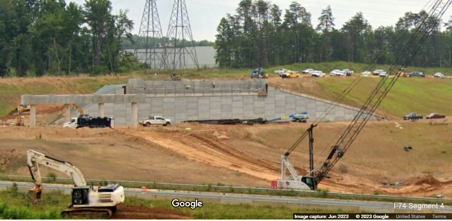 Image looking east at future I-74 lanes beign constructed as part of the 
        future Winston-Salem Northern Beltway interchange project, Google Maps Street View, June 2023