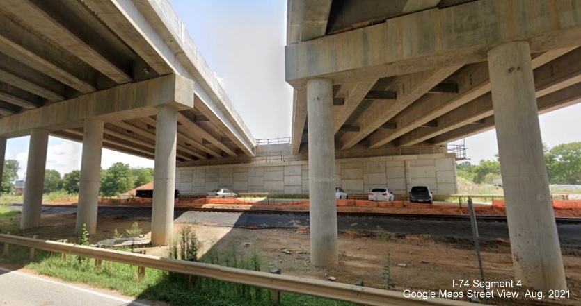 View under nearly completed bridge over Old Walkertown Road by future NC 74/Winston-Salem Northern 
        Beltway (I-74), Google Maps Street View image, August 2021