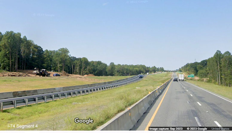 View of newly opened temporary I-74 East lanes through future Winston-Salem Northern Beltway 
       interchange construction area from I-74 West, Google Maps Street View, September 2023