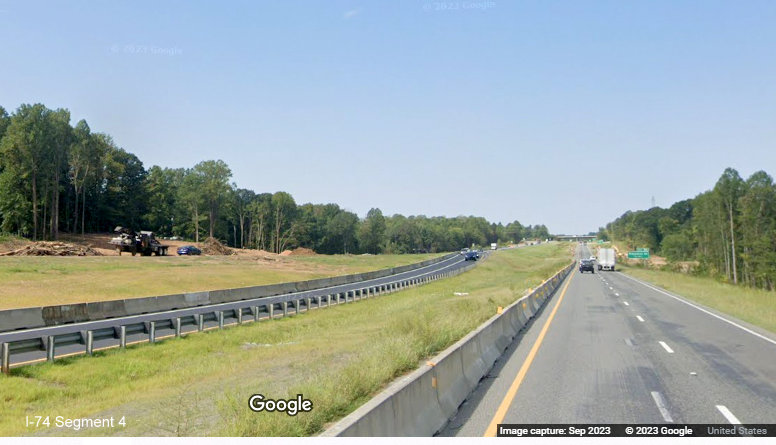 View of newly opened temporary I-74 East lanes through future Winston-Salem Northern Beltway 
       interchange construction area from I-74 West, Google Maps Street View, September 2023